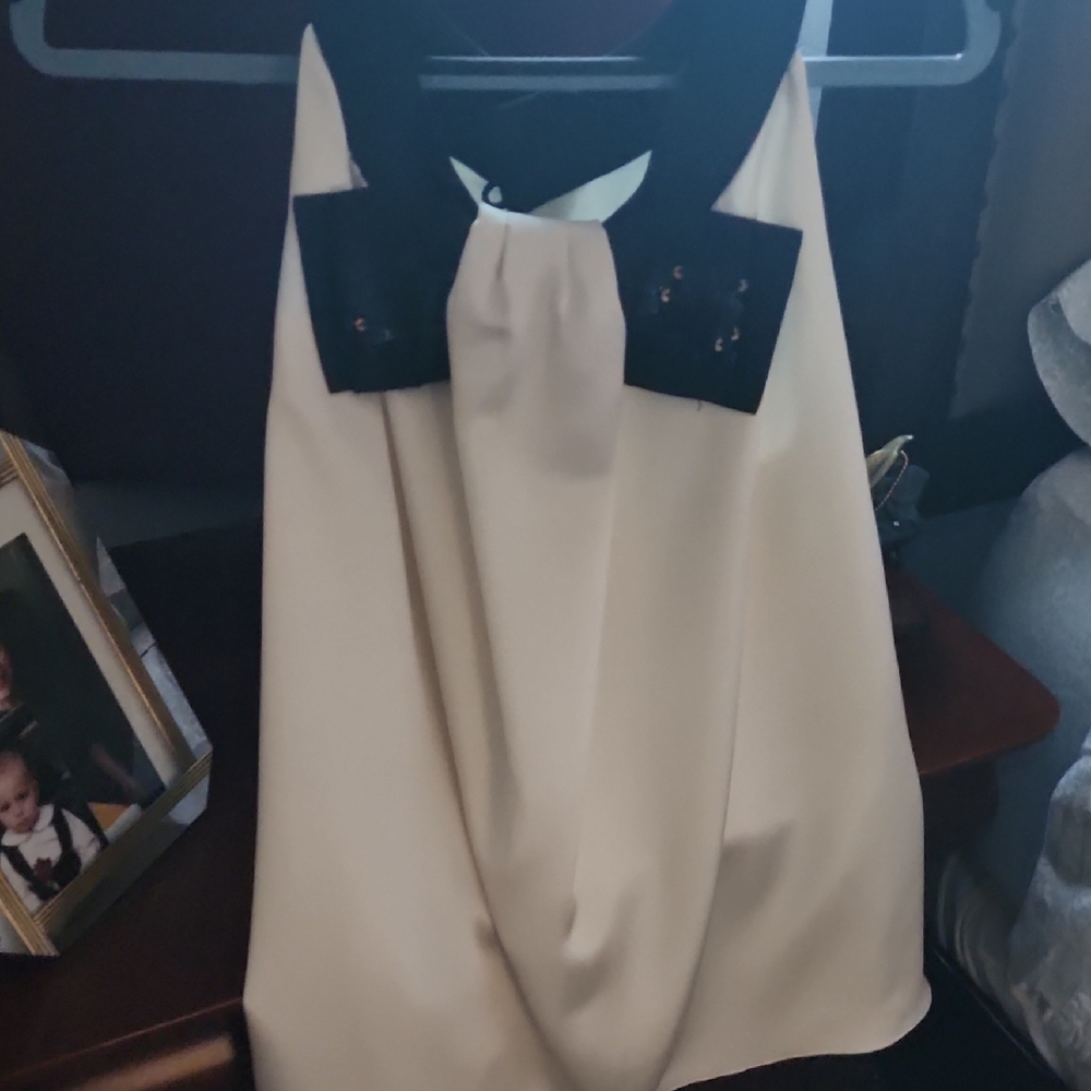 Elegant Black and Cream Sleeveless Top